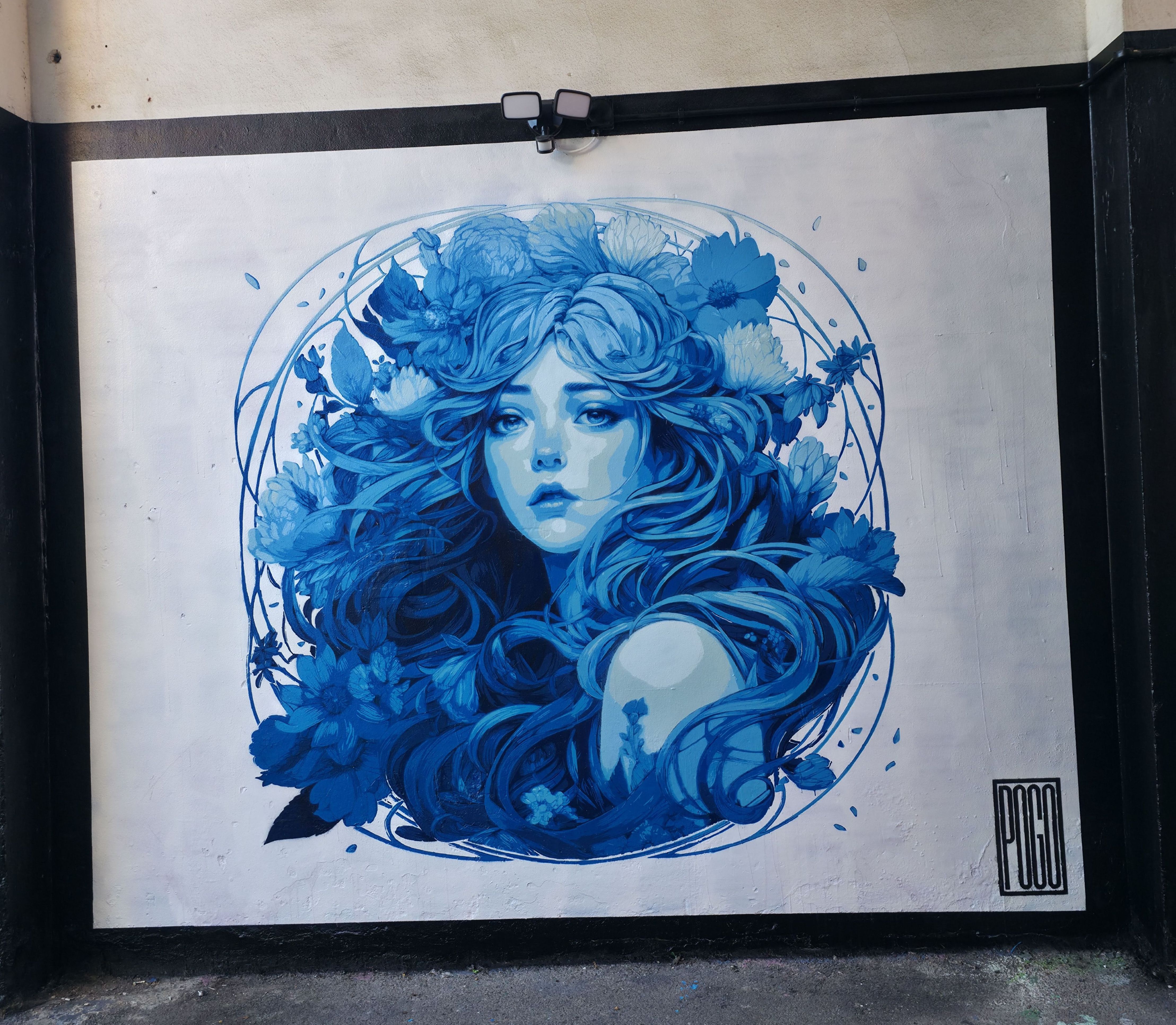 Photo of an outline of a Lady in blue ink on a white background, found in Albert Road, Southsea, Hampshire, United Kingdom. Photo taken by Baldi, A.K.A Amonn AL-Mahrouq.