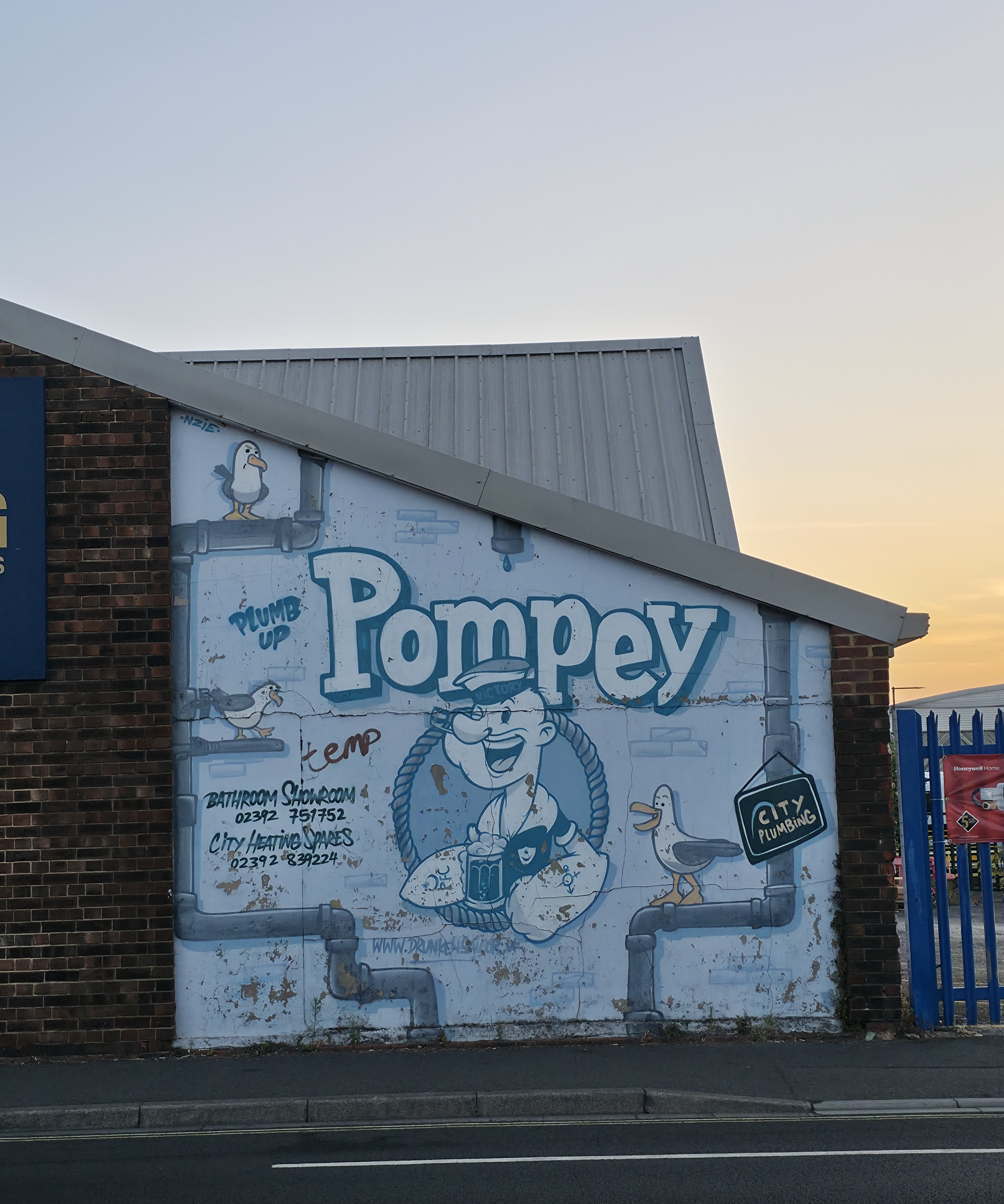 Photo of Pop Eye looking at you advertising Pompey, Portsmouth. Photo taken in Fratton, Portsmouth, United Kingdom by Baldi, A.K.A Amonn AL-Mahrouq.