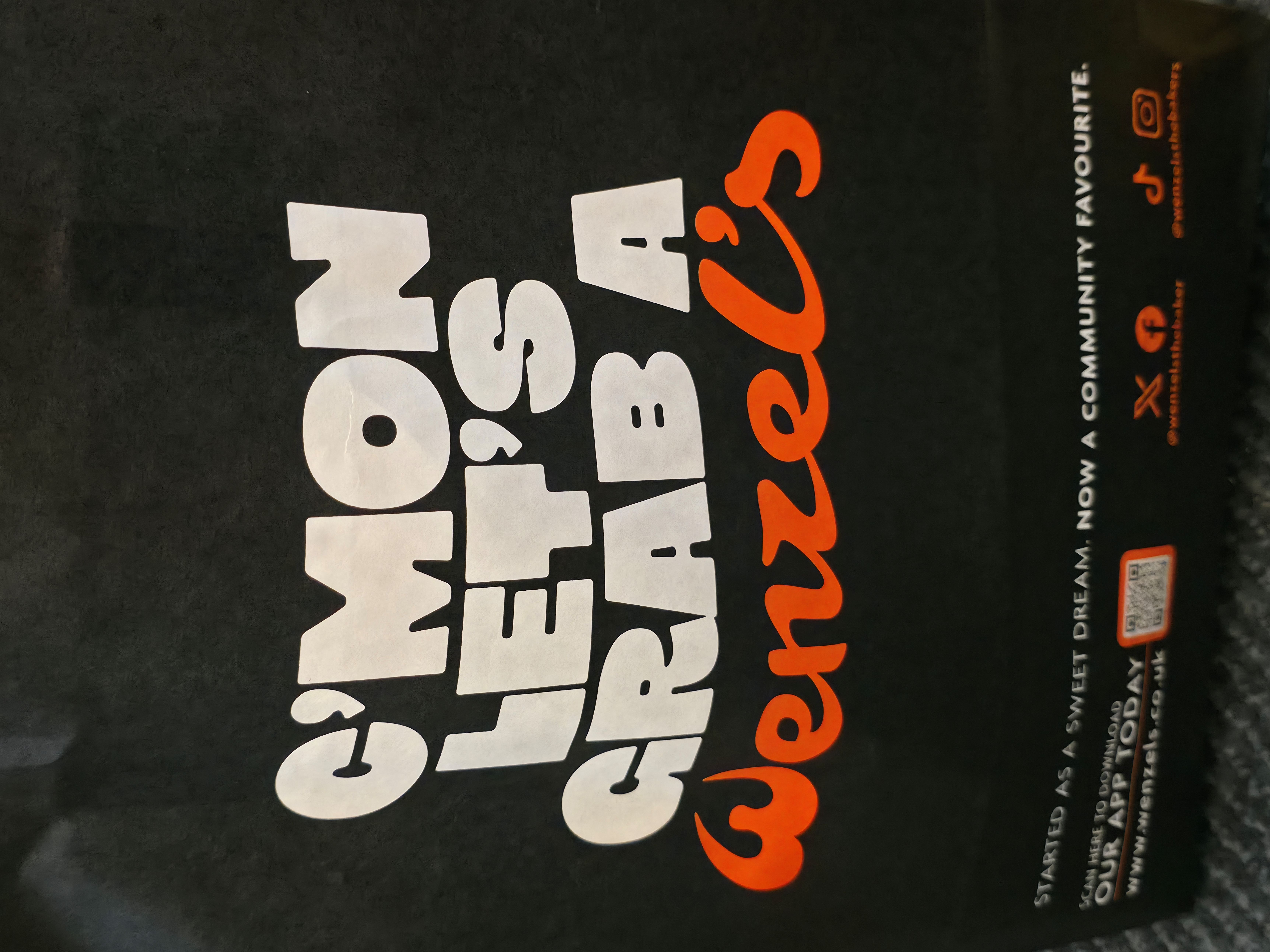 A sign on a bag saying Come on, lets grab a wenzels. Photo taken by Baldi, A.K.A Amonn AL-Mahrouq in January 2026