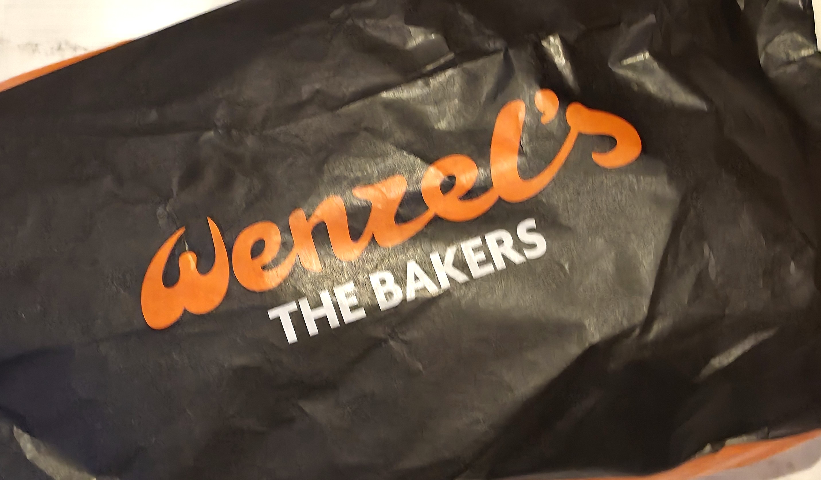 A photo of Wenzels, The Bakers Packaging Logo. Photo taken by Baldi, A.K.A Amonn AL-Mahrouq in January 2026